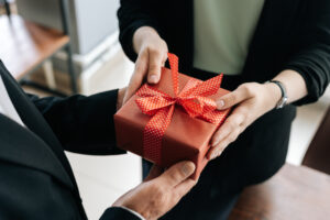 business people exchanging a gift