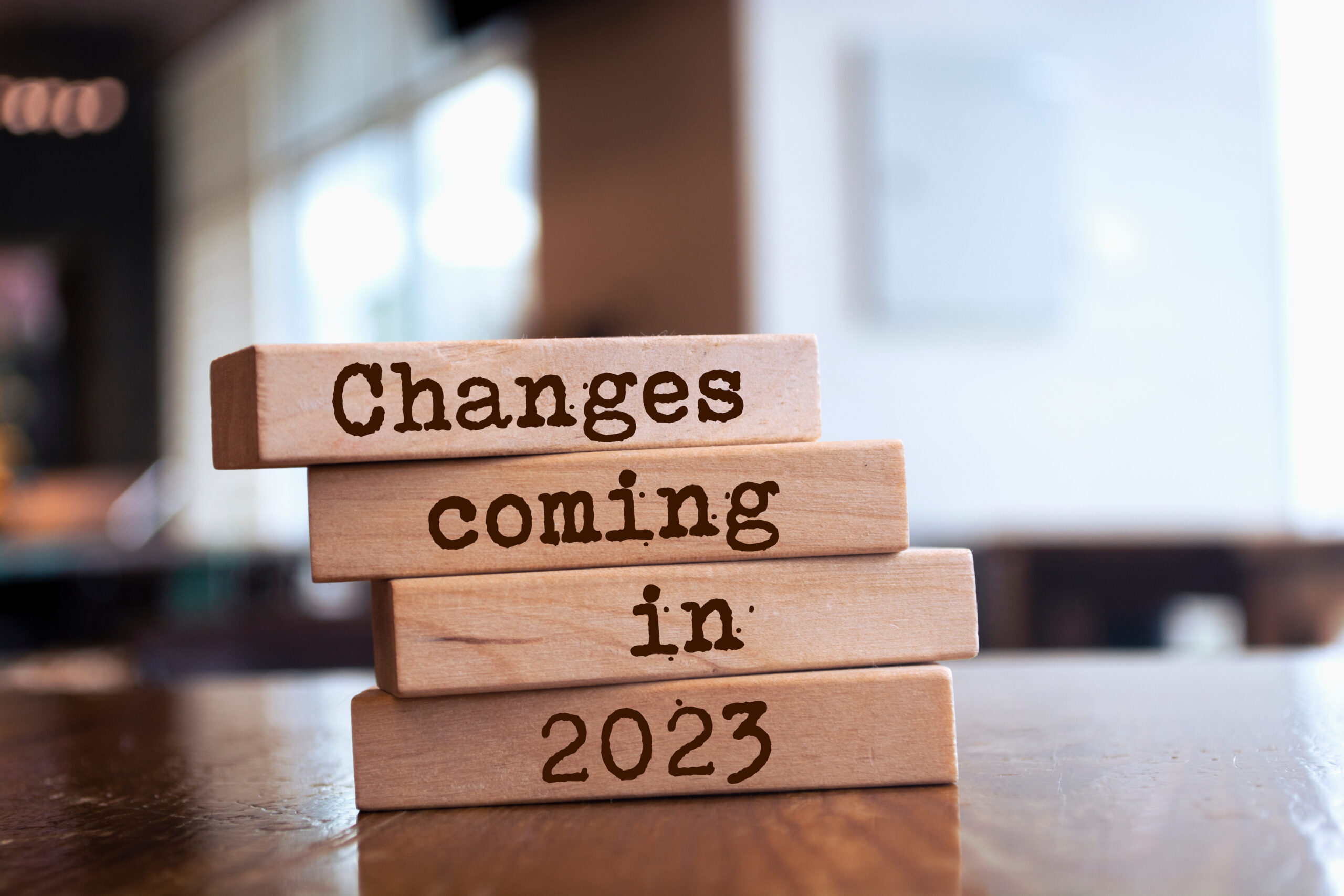 blocks on a table that say "changes coming in 2023"